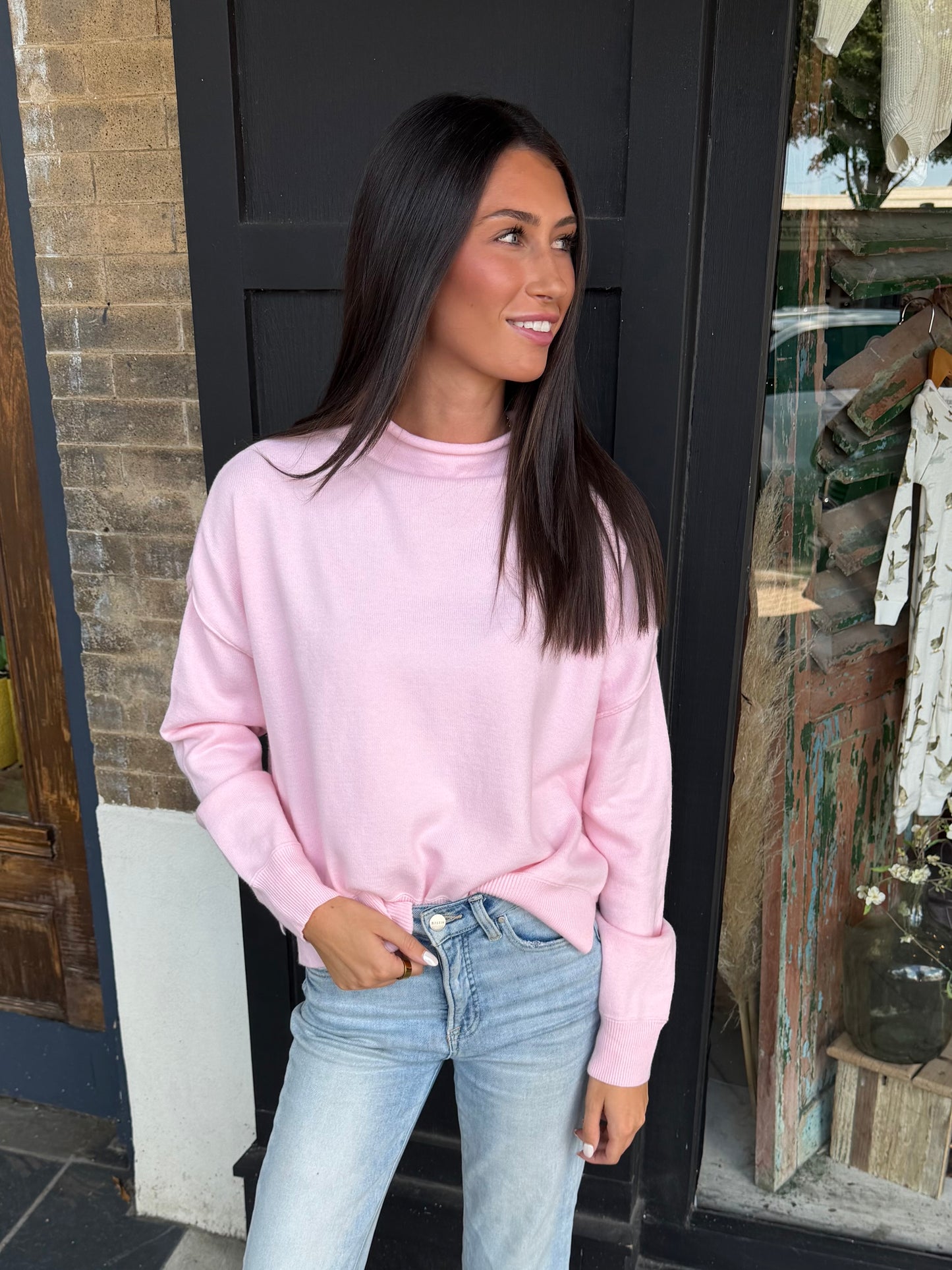 Baby pink roll-neck sweater