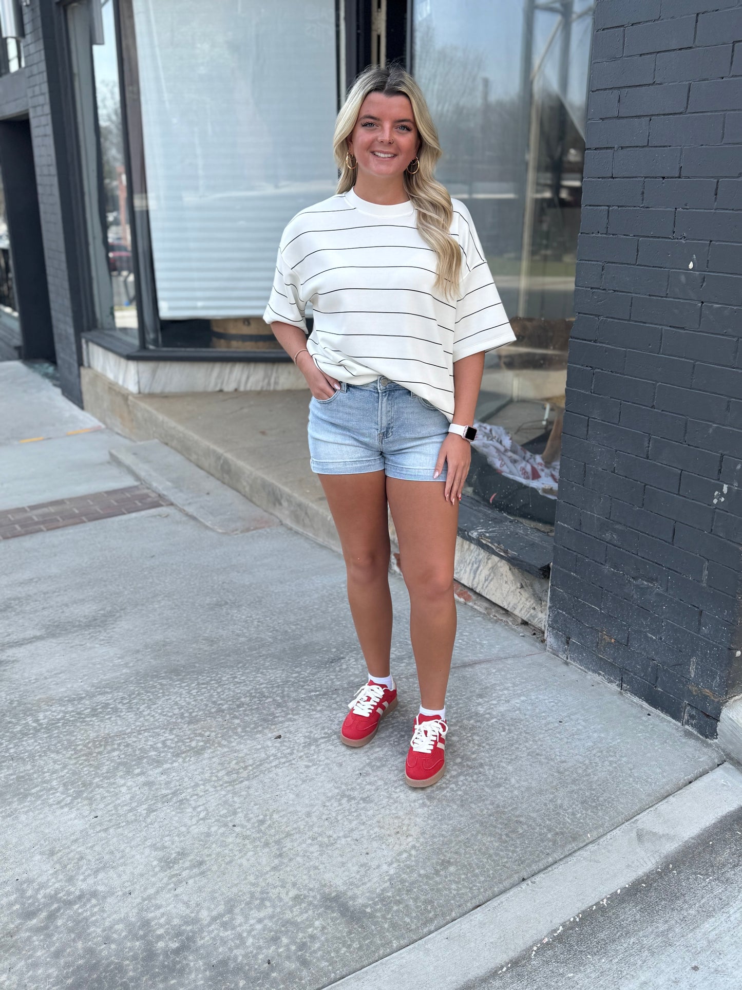 Red double stripe sneakers