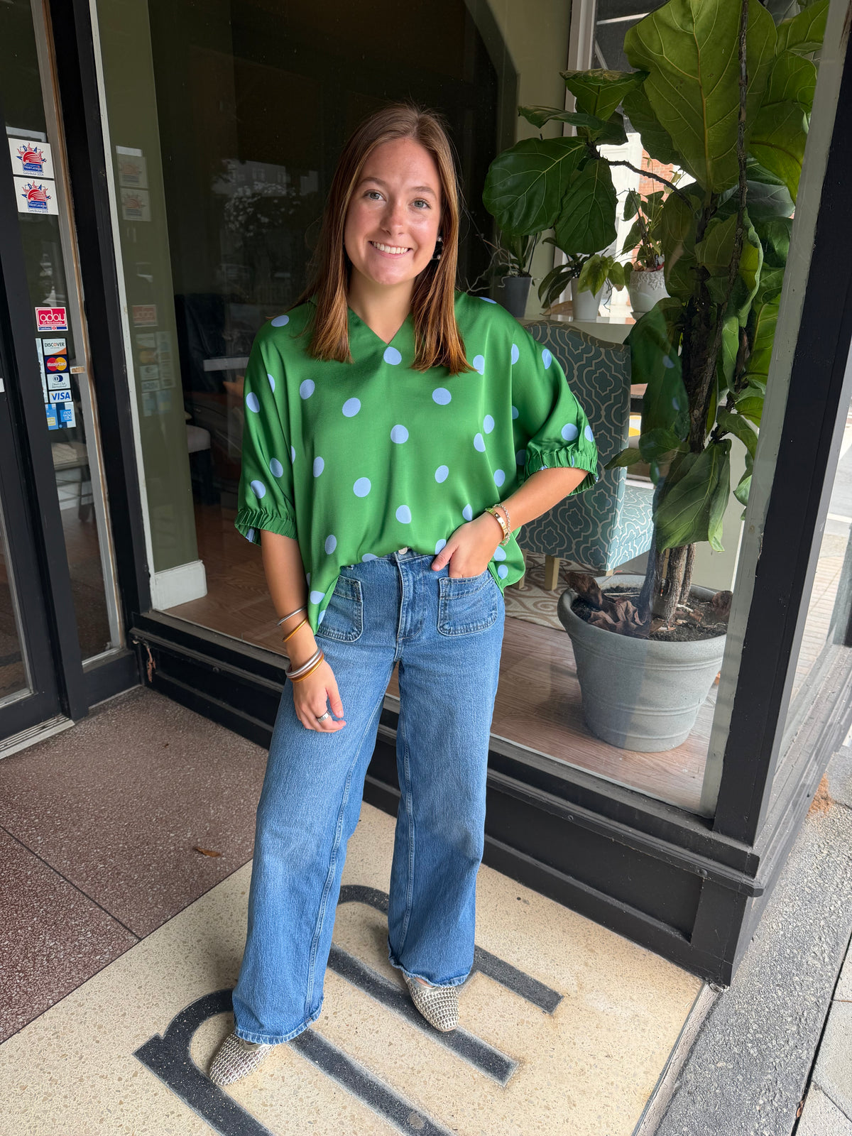 Green polka dot top