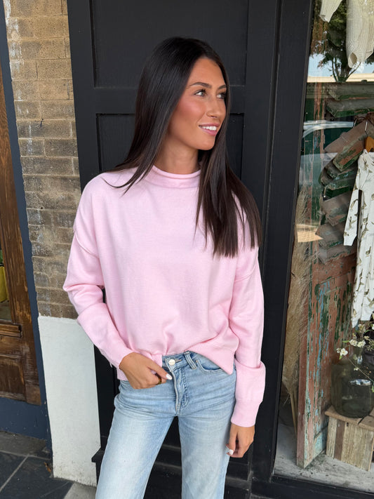 Baby pink roll-neck sweater