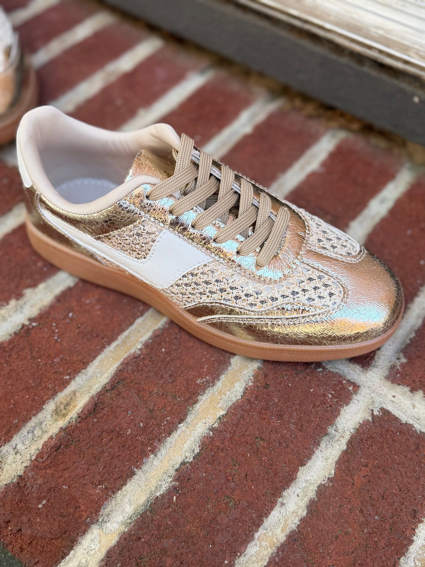 Woven gold sneakers