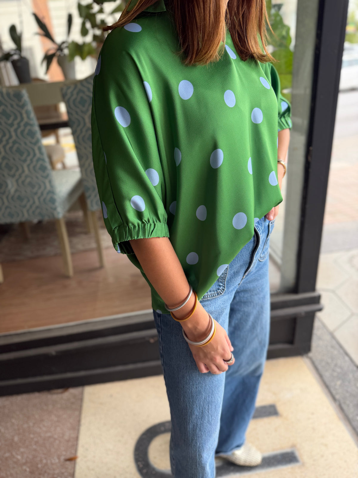 Green polka dot top