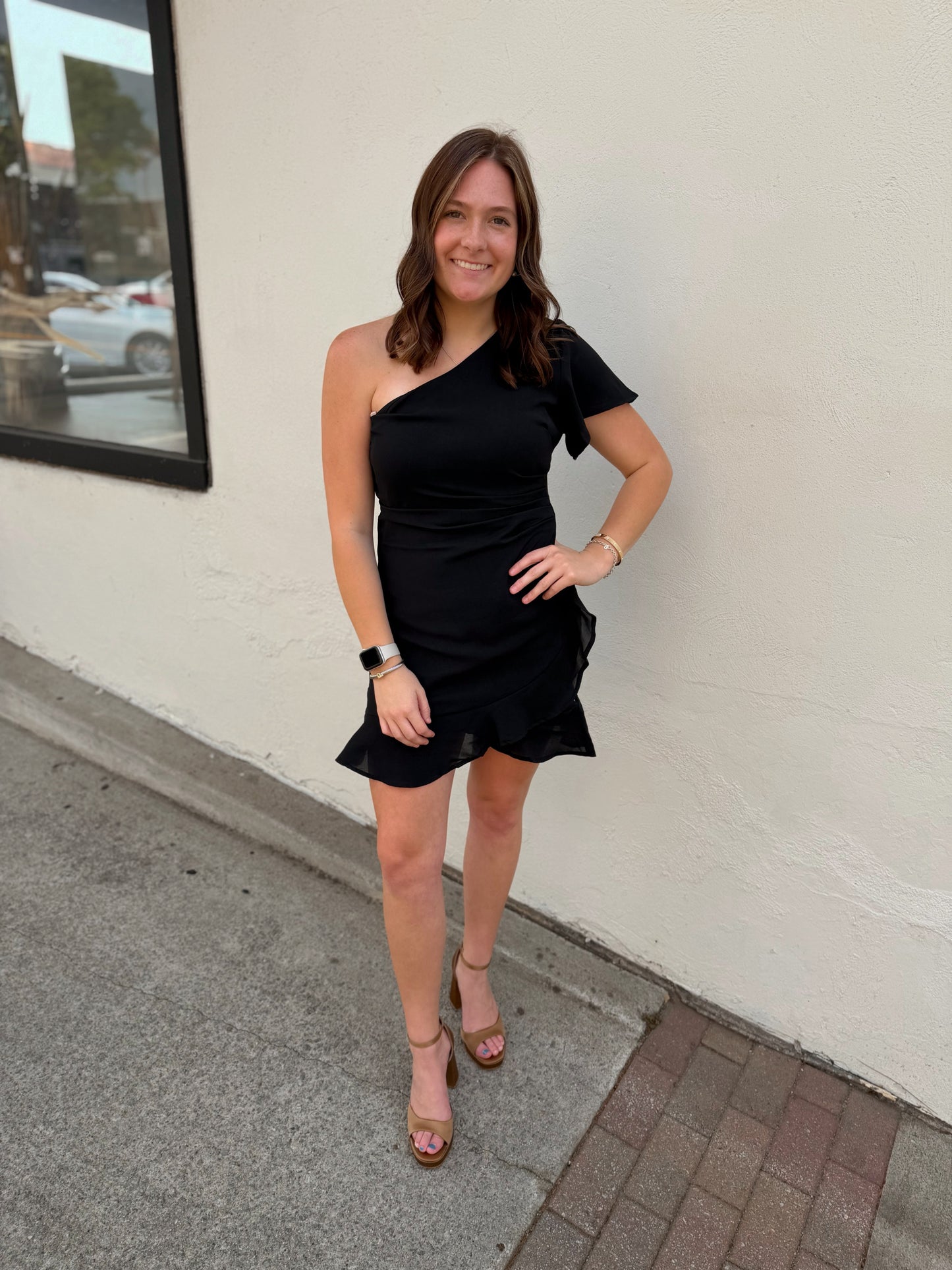 One shoulder black flutter dress